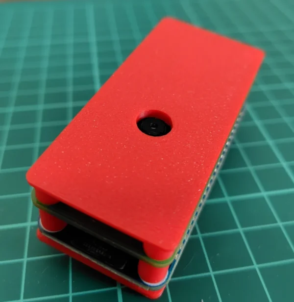 NodeAxe SeedSigner — Rear Camera View Open-frame SeedSigner rear plate with camera opening.